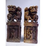 A pair of 20thC Chinese carved mottled brown soapstone seal design,