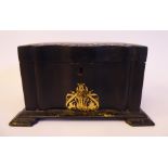 A mid Victorian serpentine outlined, black lacquered papier mache tea casket with straight sides,