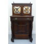 An early Victorian rosewood Davenport,