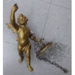 An early 20thC gilded spelter pendant light, fashioned as a 'flying' cherub,