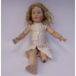 A Kramer & Reinhart bisque head doll with painted features, impressed 114 49,