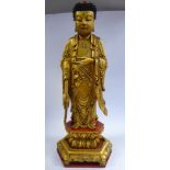 A 20thC Asian carved, gilded and red painted,
