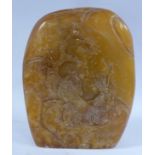 A late 19thC Chinese carved mottled brown soapstone seal of flattened arch design,