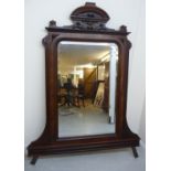 A late 19thC French bevelled overmantel mirror, set in a kingwood and carved oak frame,