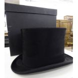 A 1920s Dunn & Co black silk top hat,