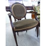 A modern French inspired carved stained beech showwood framed salon chair,