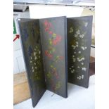 An early 20thC Japanese inspired canvas covered, four-fold room screen,