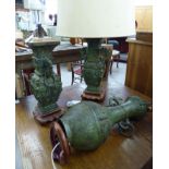 Three similar modern Chinese bronze table lamps, each with stylised floral ornament,