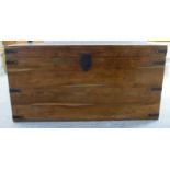 A modern boarded teak chest with straight sides and a hinged lid, on a plinth 20''h 38.