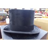 A Joshua Turner of Piccadilly black silk top hat 20'' circumference,