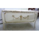 A 1950s French inspired white painted ottoman with a hinged lid and straight sides,