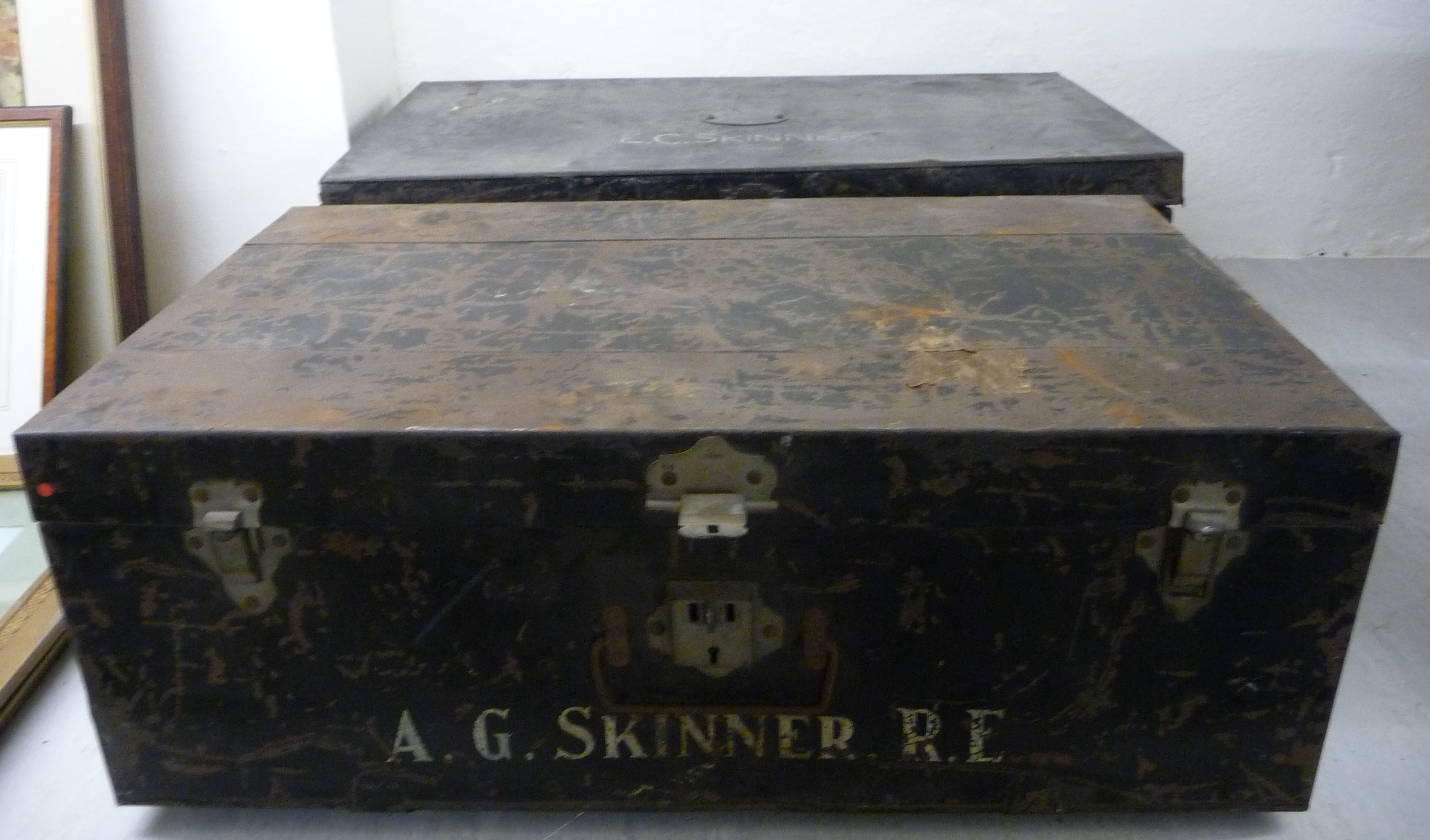 Two early 20thC black painted steel deed boxes with hinged lids 10''h 30''w & 11''h 33''w;