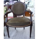 A modern French inspired carved stained beech showwood framed salon chair,