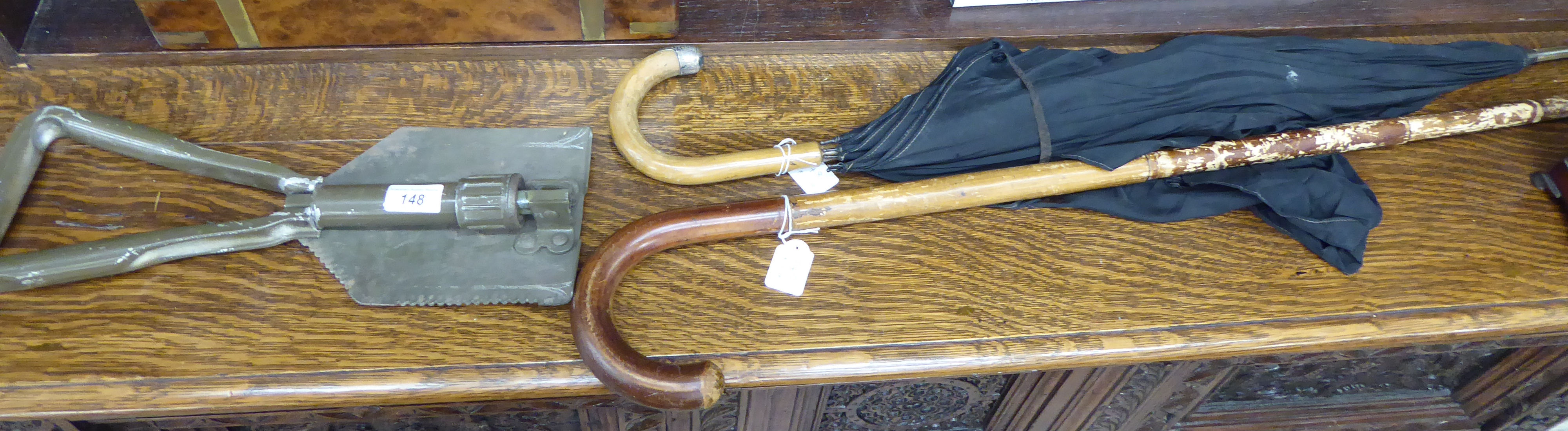 Two early 20thC umbrellas with crook handles;