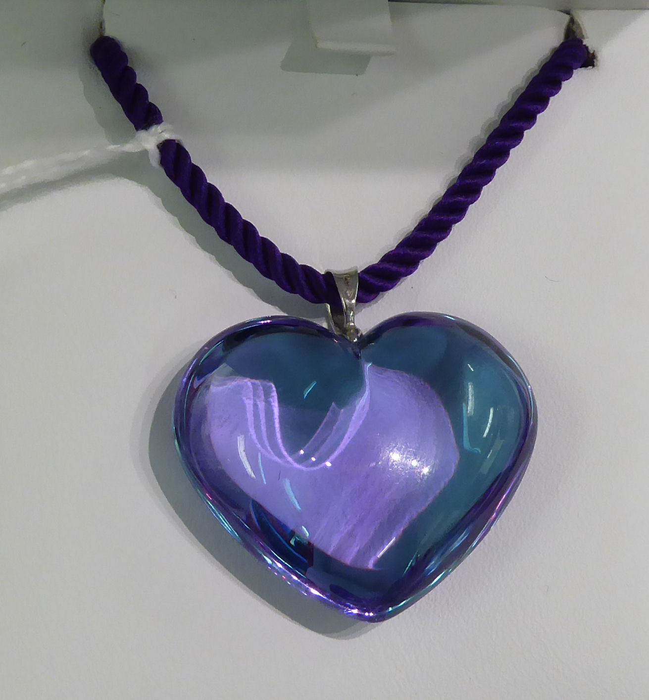 A Baccarat heart shaped pale blue glass pendant,