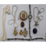 Items of personal ornament: to include a 9ct gold swivel seal pendant;