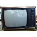 A 'vintage' Hitachi 18'' teak cased television set RAM