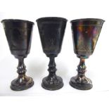 A set of four silver kiddush cups with scratch engraved ornament London 1921 CS