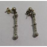 A pair of 9ct white gold diamond set ball design earrings 11