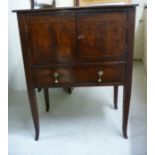 An Edwardian inlaid and crossbanded mahogany cabinet with a shelf top,