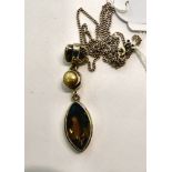 A silver citrine and pearl set pendant,