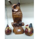 Modern carved and part painted animal ornaments, viz. a pair of nesting chickens 6.