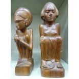 Two similar East African native carved hardwood figures,