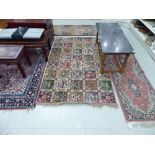 Four rugs: to include a Chinese runner,