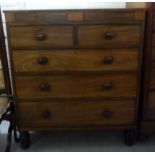 An early Victorian string inlaid ebonised and crossbanded mahogany dressing chest,