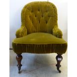 A late Victorian green fabric button upholstered nursing chair,