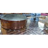 A mid 19thC shallow copper cooking pan with straight sides, a long,