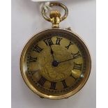 A lady's gold coloured metal cased fob watch with engraved ornament,