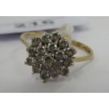 A 9ct gold white stone cluster ring,