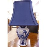 A 20thC china table lamp of waisted vase design, decorated in the style of a Delft vase,