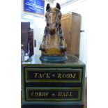 A mid 20thC painted wooden work box, surmounted by a composition horse's head,