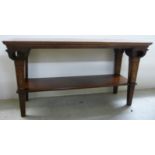 An early 20thC Continental, carved mahogany and marquetry side table,