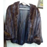 A mid-brown mink cape/jacket with rolled cuffs RSF