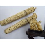 Two similar Oriental carved two-part bone needle cases;