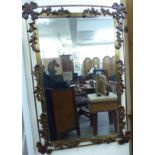 A 1930/50s bevelled mirror,