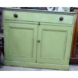 A late Victorian green painted pine side cabinet with a drawer and two doors,