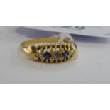 An 'antique' 18ct gold claw set sapphire and diamond ring 11