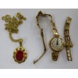 A ladies 9ct gold cased rotary wristwatch, faced by an Arabic dial; and a 14ct gold pendant,