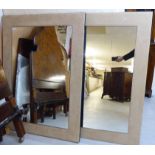 A pair of modern mirrors,