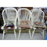 A set of six Laura Ashley cream painted hoop and spindle back dining chairs,