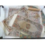 Five Chinese woollen rugs: to include one,