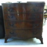 A mid 20thC George II style mahogany serpentine front,
