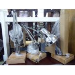 A pair of modern chrome finished metal anglepoise style lamps F