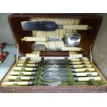 A set of engraved silver plated fish cutlery and flatware cased OS1