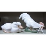 Royal Copenhagen porcelain, viz. a cockerel no.1127 3.5''h; and a pair of ducklings no.516 1.