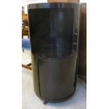 A 'retro' Kartell Binasco designer, two tier, black plastic occasional table,